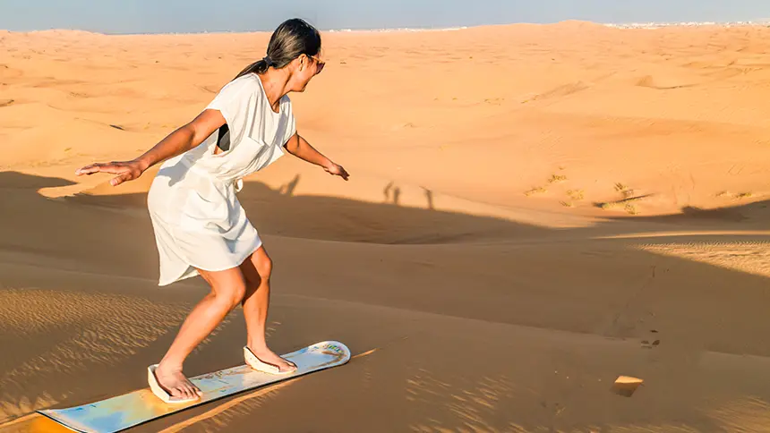 Sandboarding in Dubai Desert